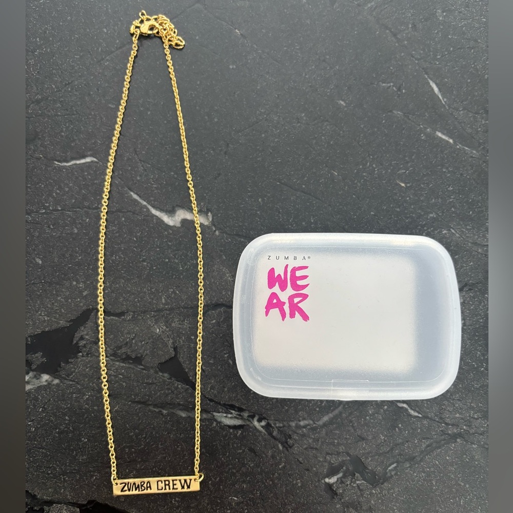 BNIB gold Zumba Crew necklace!